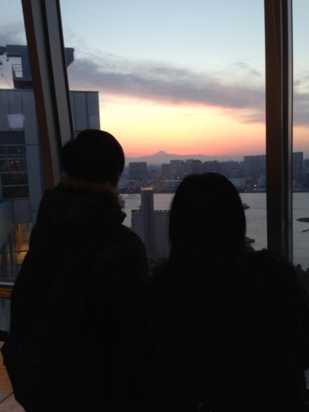 My mom and brother seeing Mt. Fuji from Odaiba